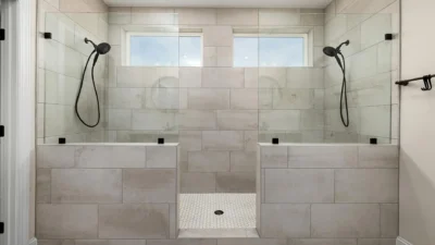 A bathroom tile cleaning checklist on a clipboard next to cleaning supplies for removing streaks and film.