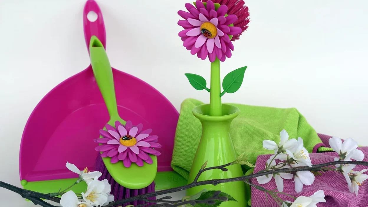 Common cleaning tool mistakes: dirty cloths, damaged brushes, and disorganized supplies on a counter.