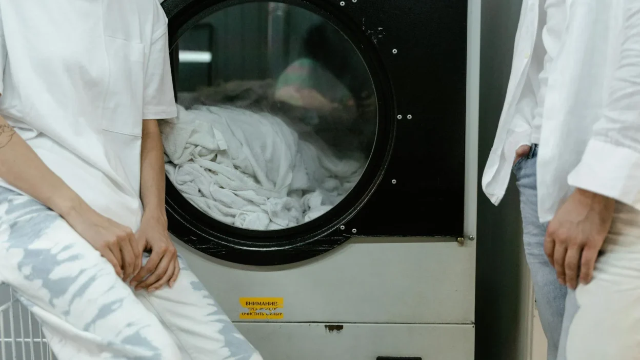 Properly washing and drying a yellow microfiber cloth to maintain its cleaning power.