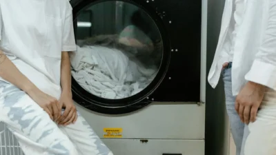 Properly washing and drying a yellow microfiber cloth to maintain its cleaning power.